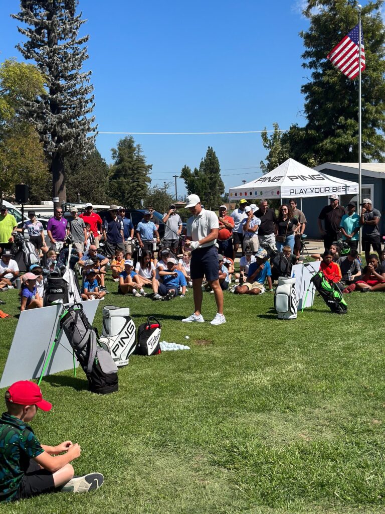 Cameron Champ on range at Foothill Golf Course for junior golf clinic