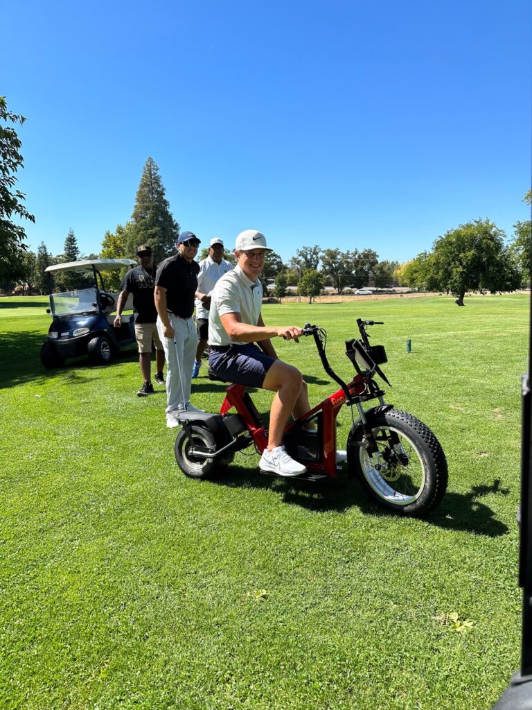 Cameron Champ on scooter cart
